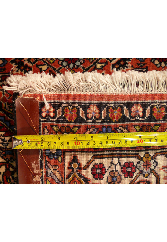 Extreme close-up of the rug’s backside showing individual wool knots and craftsmanship of the Bijar weaving technique