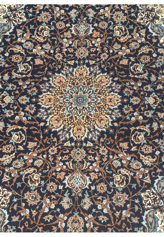 Detailed midfield of Persian Isfahan rug showing symmetrical vines, floral motifs, and silk highlights on navy background