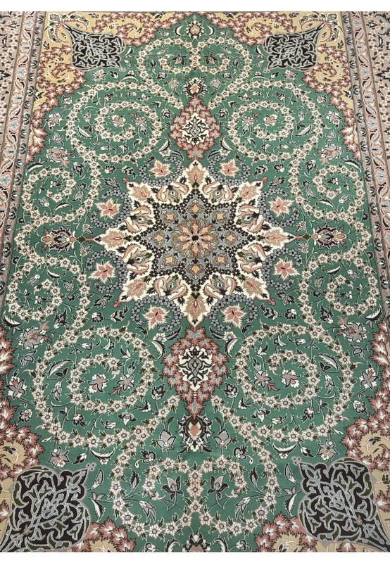 Central floral medallion of Persian Isfahan rug with silk highlights