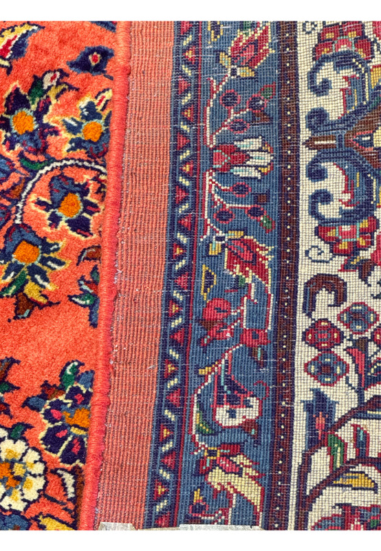 Persian Sarough rug backside showing dense hand-knotted wool on cotton foundation, fine craftsmanship from central Iran.
