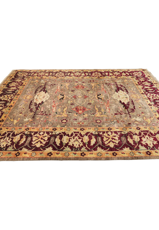 Wide shot of Afghan Handmade Chobi Peshawar Rug in earthy taupe and golden border design