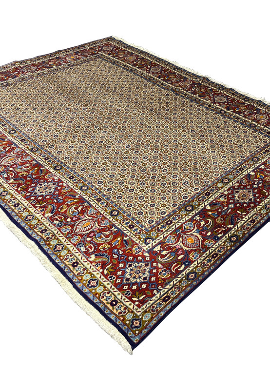Angled view of Persian Moud All-Over Rug highlighting intricate border and ivory field