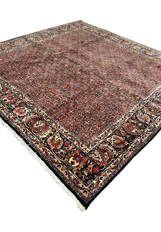 Angled side view highlighting the texture and pile of the Bijar Rug