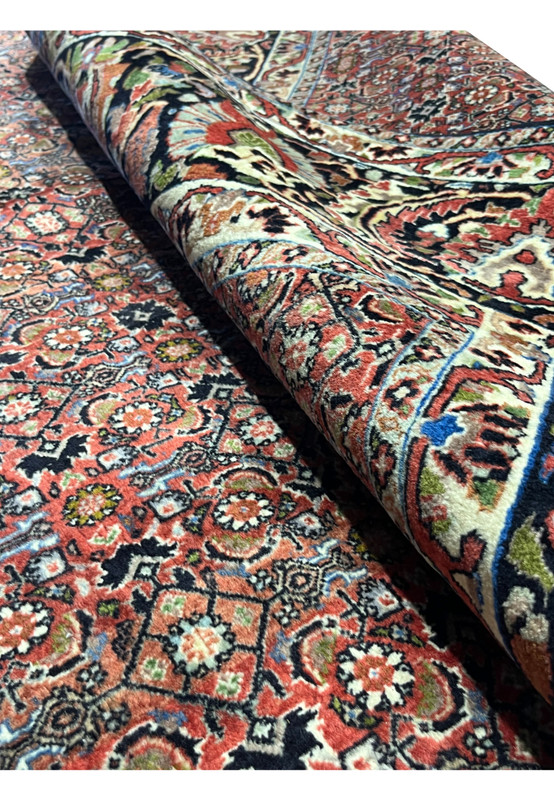 Rolled view showing the rug’s flexibility and pile density