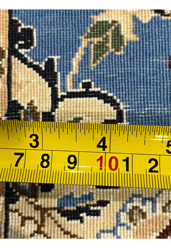Back view of 2'8 x 17'2 Persian Nain 6LA Runner with ruler measuring fine hand-knotted weave on cotton foundation.
