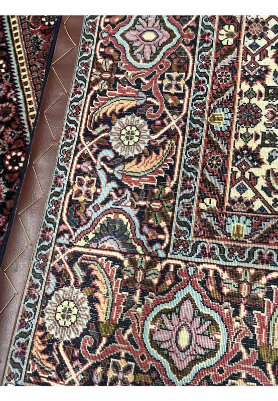Backside view of hand-knotted 6'5" × 6'2" Bijar Persian rug showing tight wool knots, leather edge reinforcement, and detailed floral border craftsmanship.