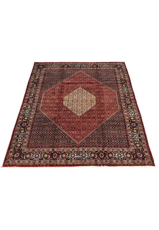 10x13 Bijar Persian rug laid flat displaying overall red, navy, and ivory design