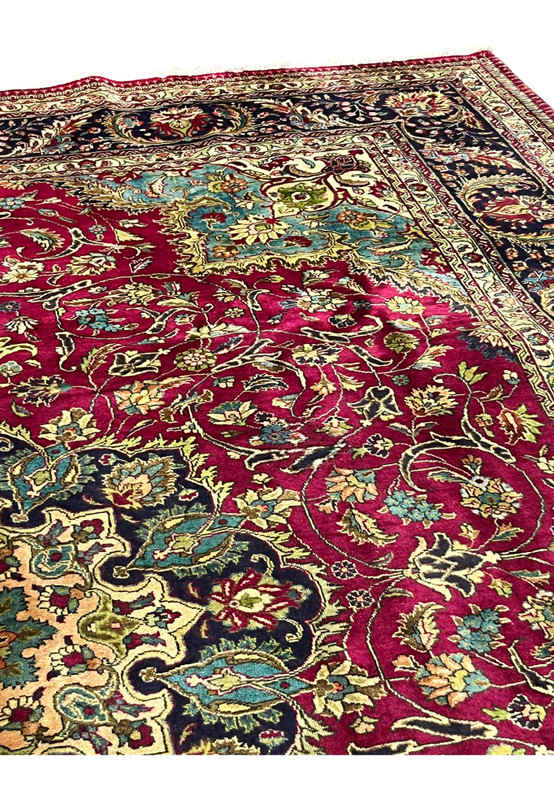 field view highlighting wine red background with interlaced floral vines and botanical motifs