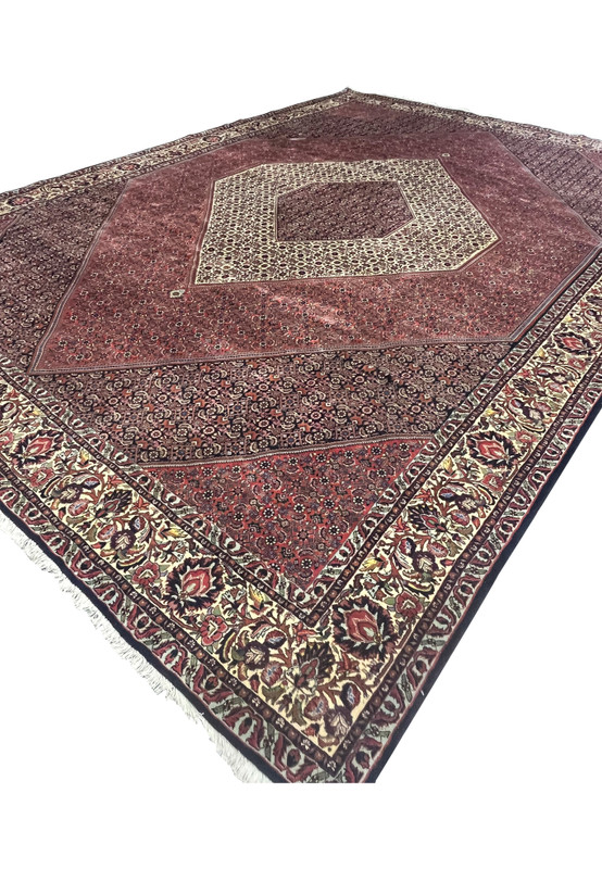 Angled perspective of Persian Bijar rug showing thickness and structure