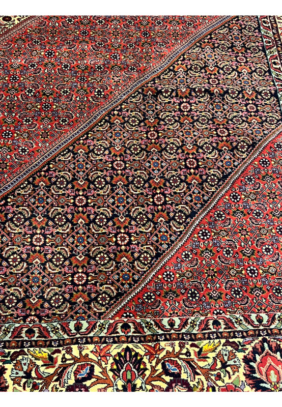 Inner lattice pattern of Persian Bijar rug showing dense knot structure