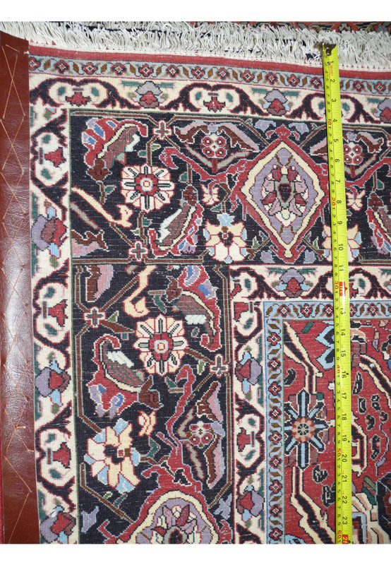 Backside of dense Bijar iron rug highlighting heavy wool pile, tight knot structure, and strong cotton foundation