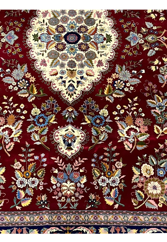 Detailed pattern close-up of Persian Isfahan rug with silk highlights and fine knot structure