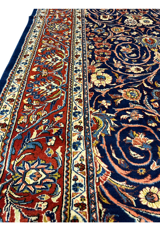 Side border view highlighting hand-knotted craftsmanship of Persian Sarough rug
