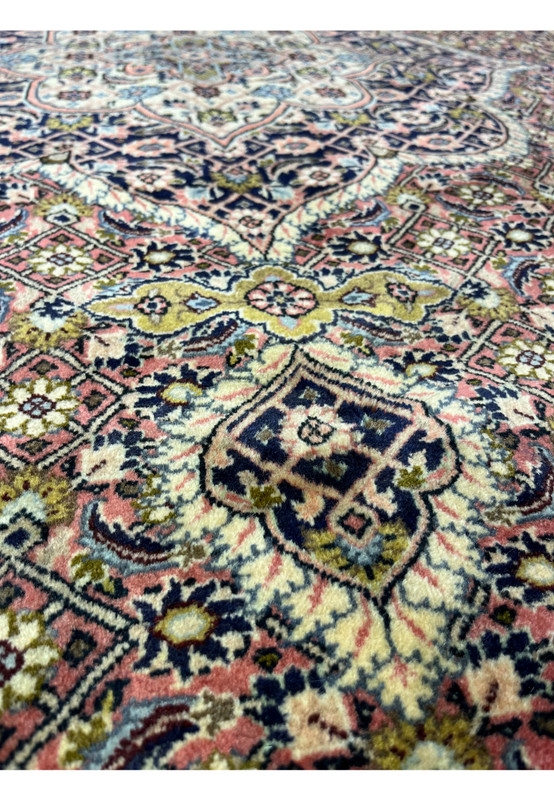 Pattern close-up of Persian Bijar rug displaying compact floral lattice and dense knot structure
