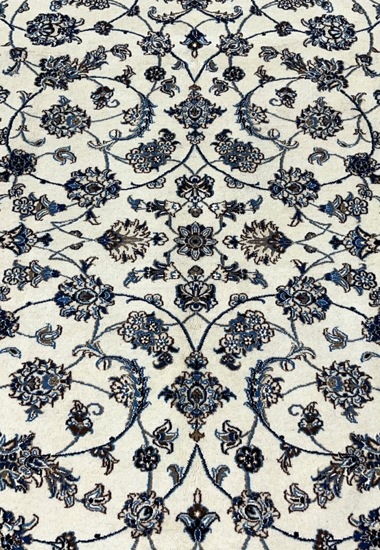 Detailed allover pattern closeup of Persian Nain 9 LA wool and silk rug