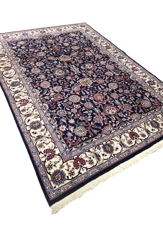 Angled view of Persian Sarough kork rug revealing pile texture and depth of navy blue field