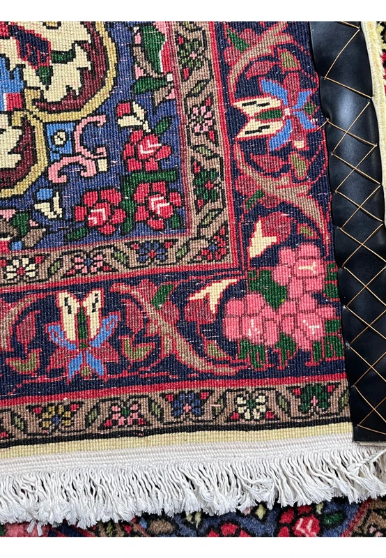 Back of Persian Bijar floral rug showing uniform knots, strong structure, and authentic hand knotted Iranian craftsmanship
