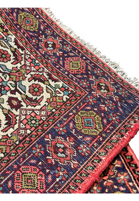 Backside of hand-knotted Persian Gholtogh rug displaying tight knot structure and authentic village craftsmanship
