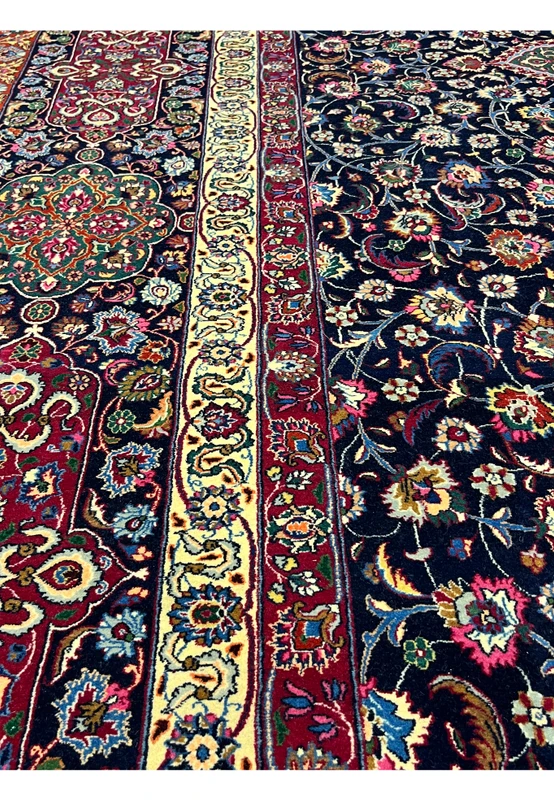 Overall Persian Mashad rug design showing balanced medallion layout, dense floral field, elegant borders, and fine kork wool with silk detailing