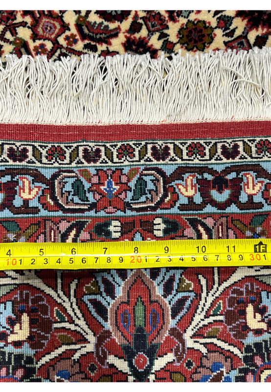 Close-up of the backside of a Persian Bijar rug revealing compact knots, heavy wool construction, and exceptional durability typical of iron rugs