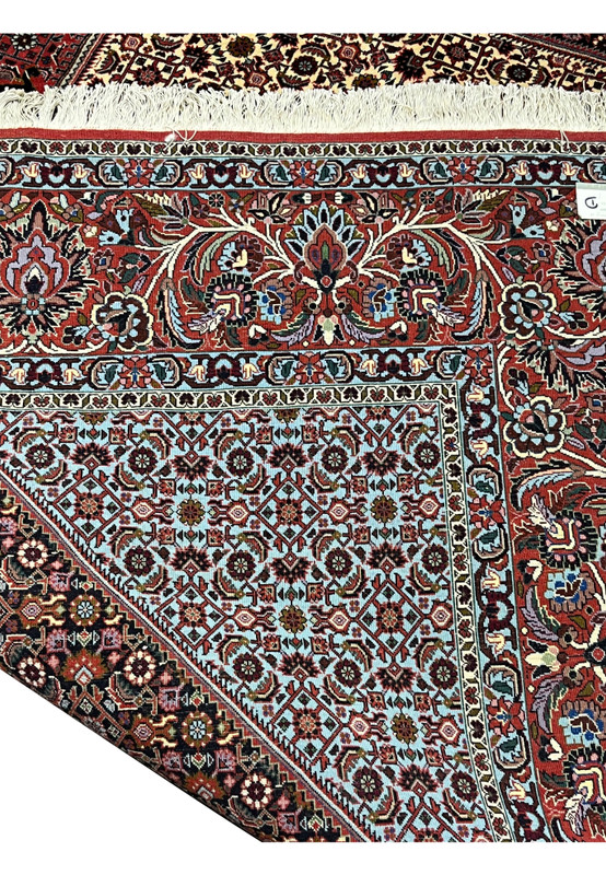 Backside of a hand-knotted Persian Bijar iron rug showing tight knot structure, high knot density, and traditional wool foundation