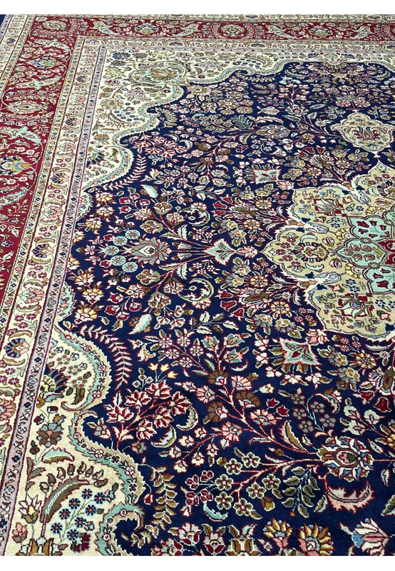Face and foundation close-up of an 11'2 x 14'4 Persian Tabriz rug revealing tight knot structure and high-quality wool pile