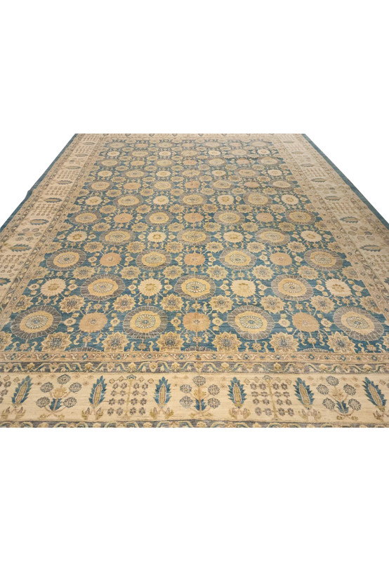 Top view of a light blue Chobi Peshawar rug displaying symmetrical floral medallions, cream and sand accents, and a structured border surrounding the field