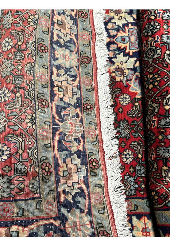 Backside view of a Persian Sarough rug highlighting tight knot structure, traditional foundation, and clear pattern definition