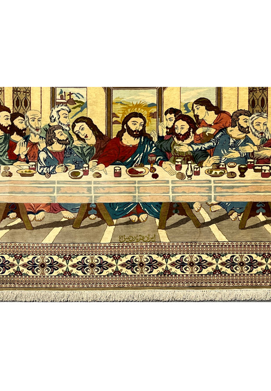 Midfield view of signed Persian Qum silk pictorial rug displaying The Last Supper table scene with rich colors and precise hand-knotting