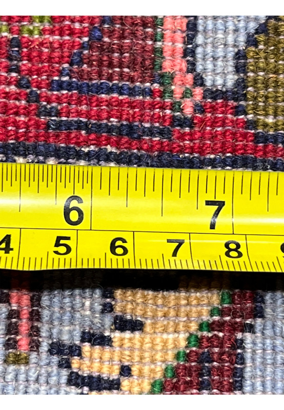 Zoomed backside detail of Persian Senneh rug highlighting uniform knots, fine craftsmanship, strong foundation, and careful hand weaving