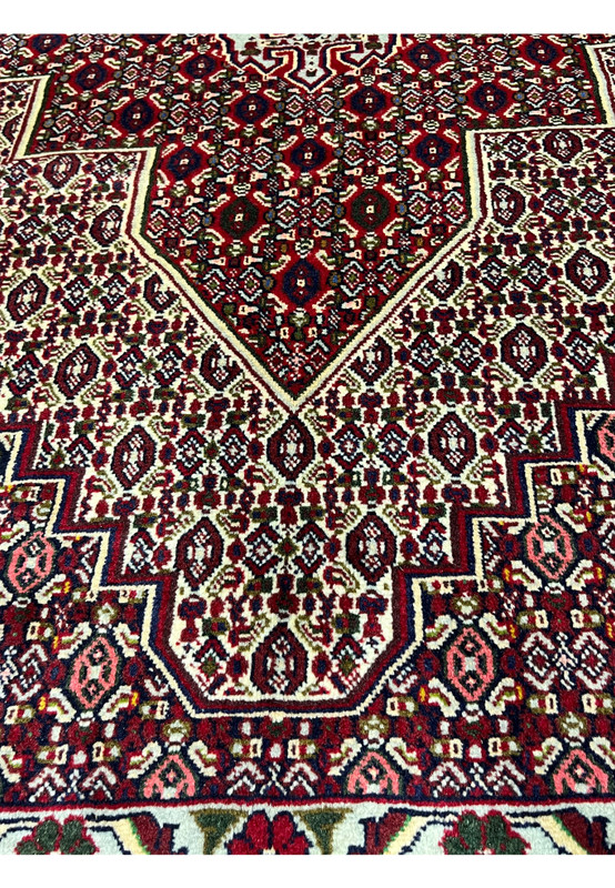 Face and foundation close-up of Persian Senneh rug revealing tight knot structure, clean weaving, precise color changes, and durable wool build