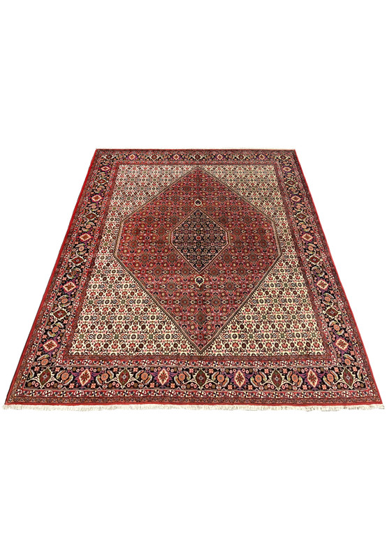 Top view of Persian Bijar rug showing ivory field contrast, bold red medallion, crisp lattice geometry, and finely articulated border patterns