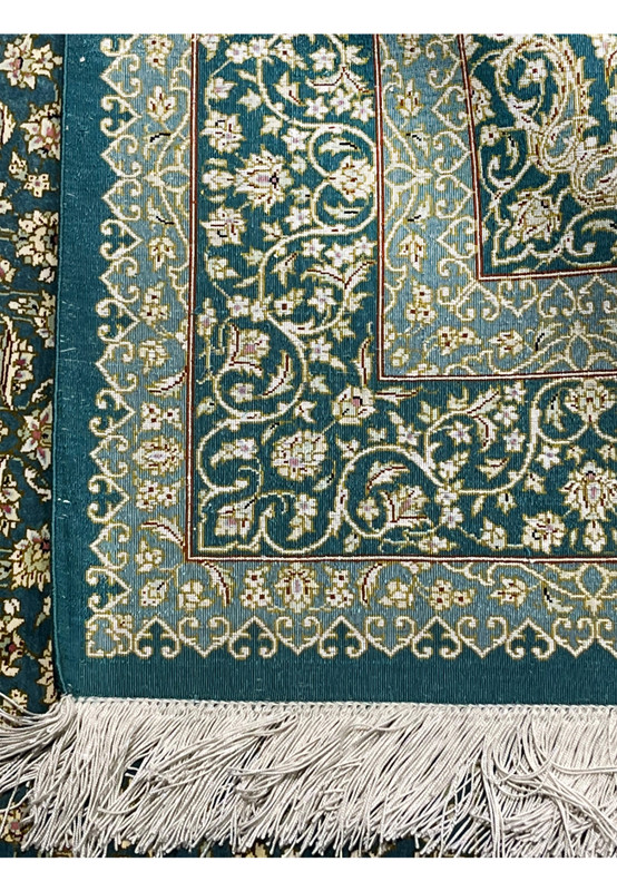 Backside of Persian Qum silk rug displaying dense knot grid, clear pattern visibility and authentic hand knotted craftsmanship