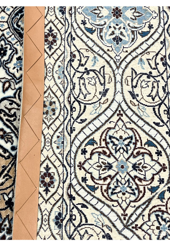 Backside of Persian Nain Habibian 6 LA rug showing fine knot density cotton foundation and detailed dome weave structure.