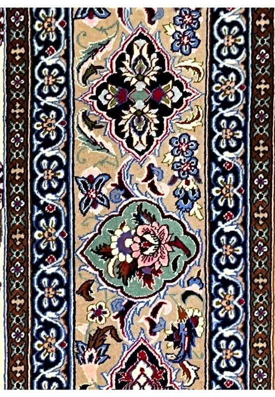 Border closeup Persian Isfahan wool silk rug taupe ground black green cartouches navy arabesque guard stripe