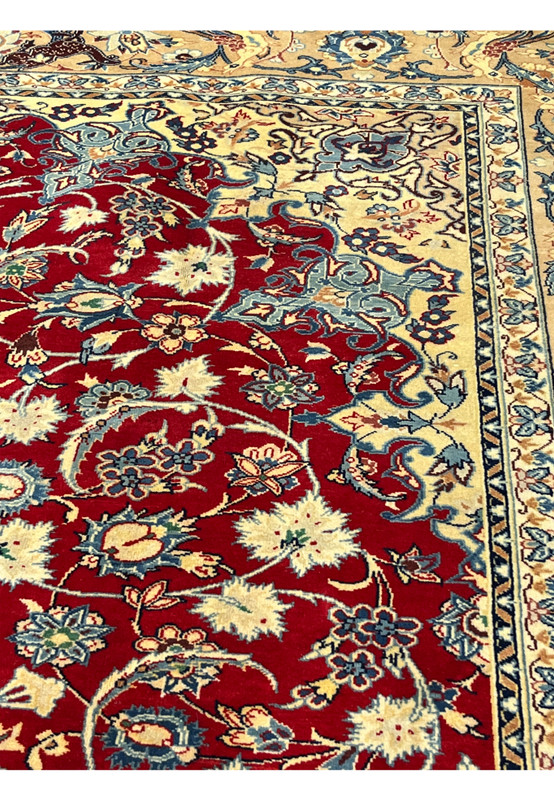 Pattern detail 10x13 Persian Isfahan wool rug crimson red field ivory floral blooms blue scrollwork handmade Persia