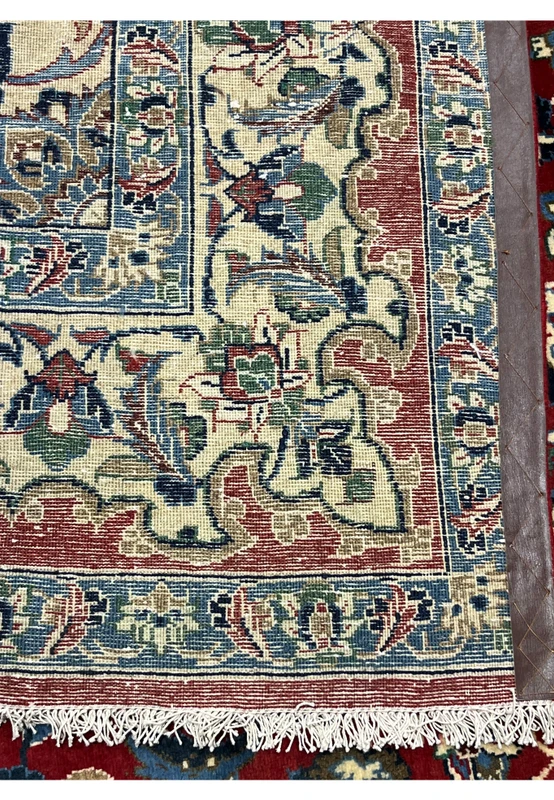 Backside 8x12 Persian Isfahan wool rug hand knotted cotton foundation crisp floral pattern visible through weave