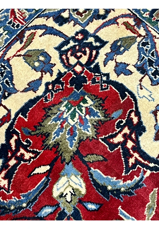 Pattern and motifs detail 8x12 Persian Isfahan wool rug crimson red field ivory blue green floral arabesques handmade