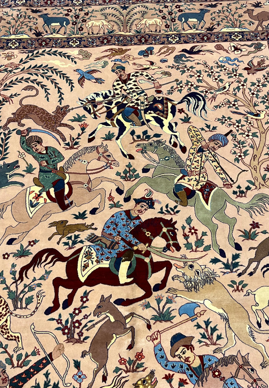 Hunter and horses detail in 5x8 Persian Isfahan Seirafian wool silk rug on blush ground