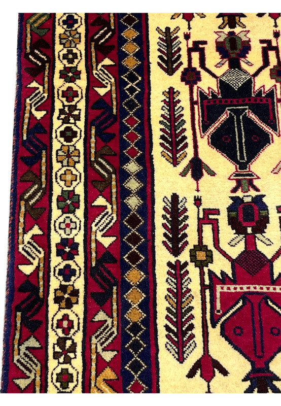Close-up of tribal border on 5x8 Persian Afshar rug with geometric and diamond repeating motifs