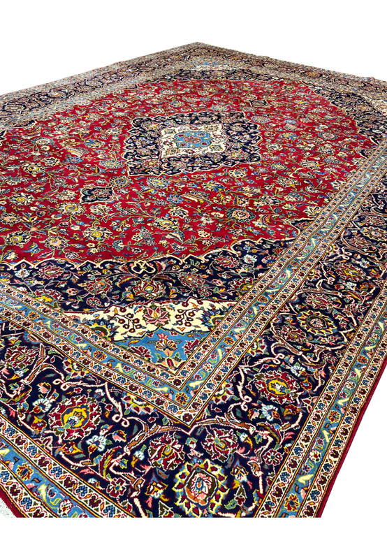 10x14'7 Persian Kashan rug featured on Shark Tank crimson navy medallion floral angled view
