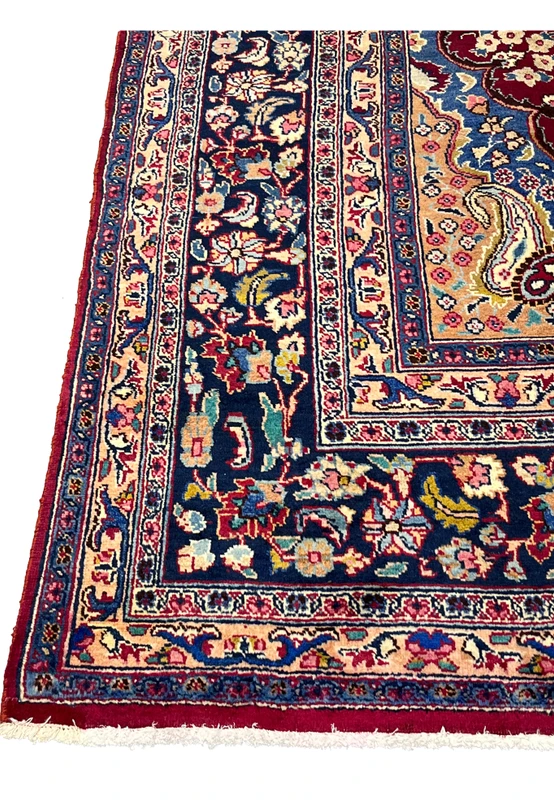 10x13 distressed antique Persian Mashad rug navy main border floral vines rosettes paisley