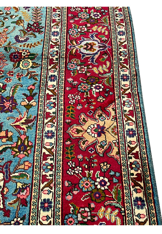 Border closeup of 10x13 Persian Tabriz rug, classical floral vine with rosettes and palmettes
