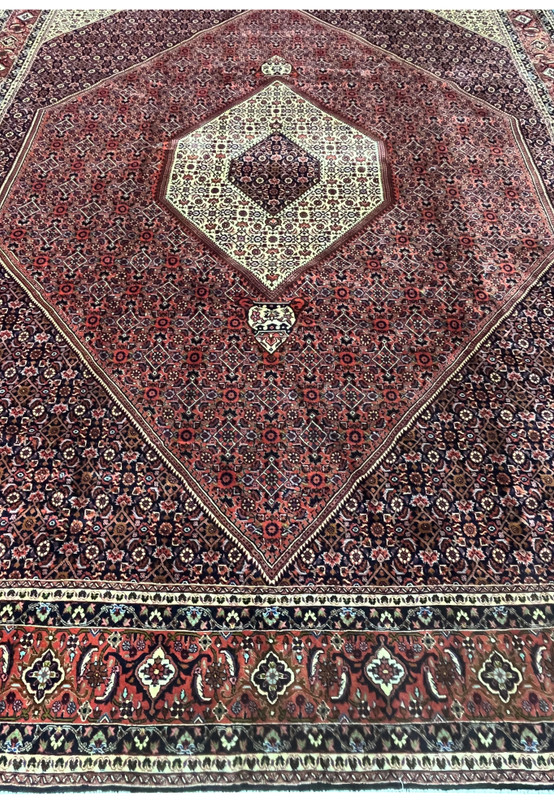 Red Persian rug with ivory hexagonal medallion, 10x13 hand-knotted wool from Bijar