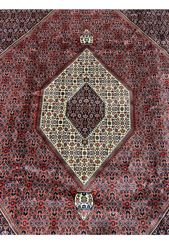 Ivory hexagonal medallion with navy inner diamond, central design of 10x13 Bijar rug