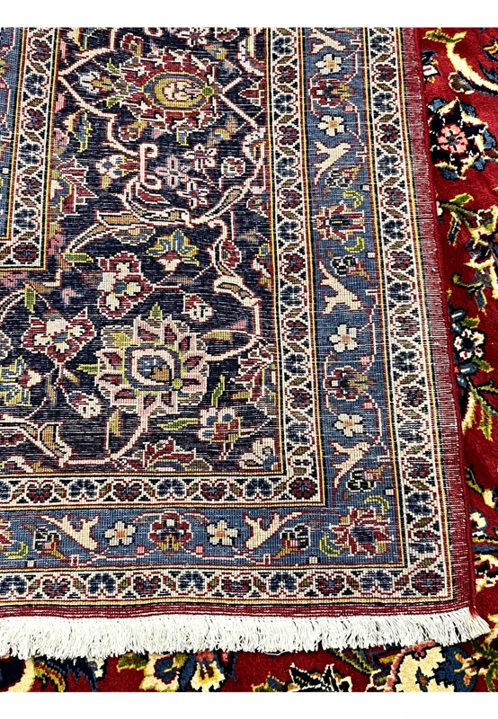 Backside of this authentic Persian Kashan rug showing hand-knotted weave on pure cotton foundation