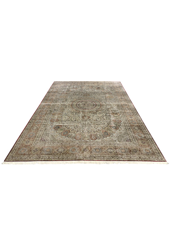 Top-down view of this large Turkish pure silk rug showing full medallion composition and dense floral tracery