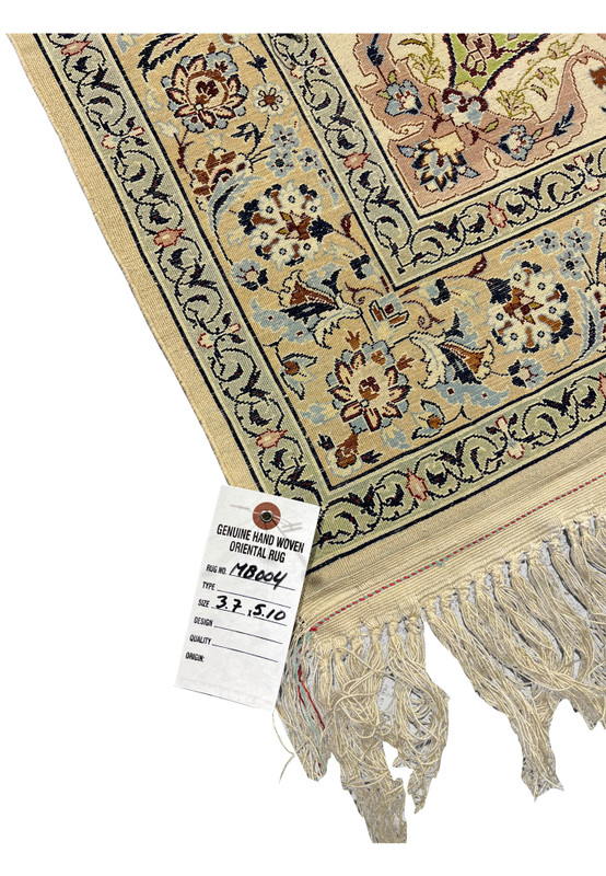Authentication tag on the back of this 4x6 signed Sarraf Mamoury Persian Isfahan vintage rug