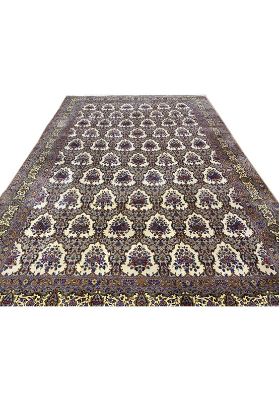 Oversize Persian Qum rug laid flat showing rows of ivory cartouches and gold mustard main border