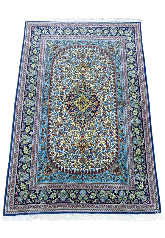 3'5 x 5'4 Persian Qum kork rug top view showing arched cartouche field and lachak toranj medallion